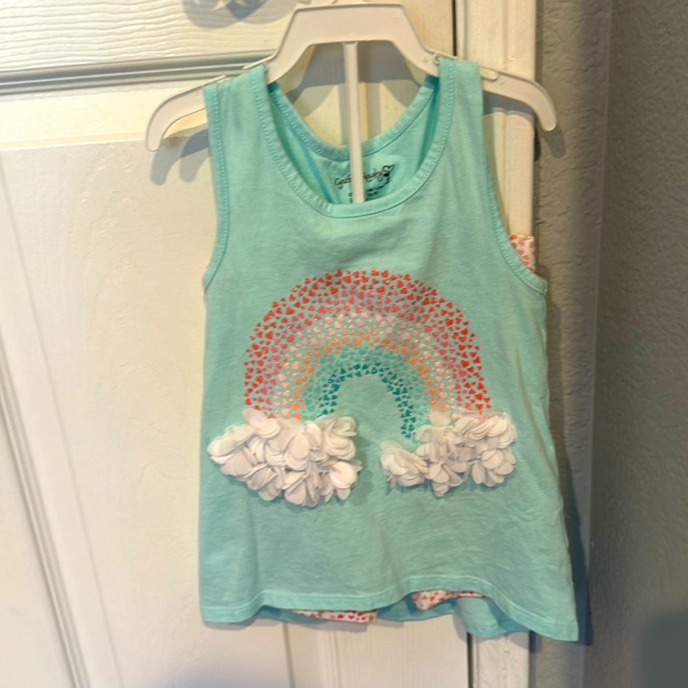 Two piece long shorts and top. Adorable rainbow with ruffles.